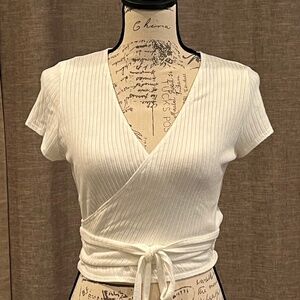 Reformation short sleeved wrap top, size M